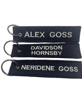 Load image into Gallery viewer, Custom embroidered key ring patch 130mm x 30mm in Navy and white .

