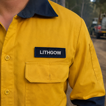 Load image into Gallery viewer, Navy blue name patch with yellow and white text colour options shown together

